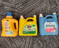 Large Laundry detergent bottles on carpet 3d point cloud thumbnail